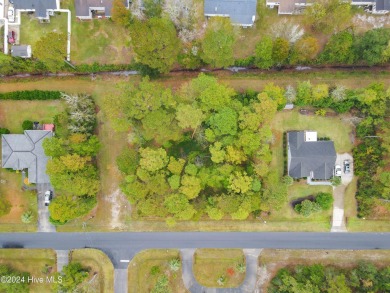 Beautiful approximately .68 acre property nestled in the acreage on Carolina Shores Golf Course in North Carolina - for sale on GolfHomes.com, golf home, golf lot