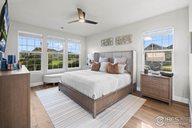 This stunning corner townhome backs to green space and offers a on Pelican Lakes Golf and Country Club in Colorado - for sale on GolfHomes.com, golf home, golf lot