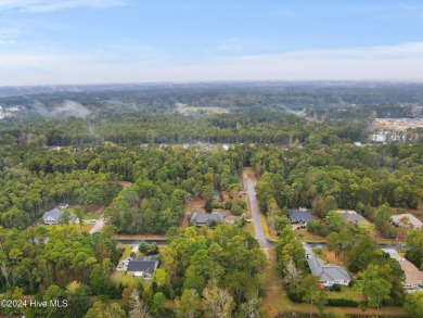 Beautiful approximately .68 acre property nestled in the acreage on Carolina Shores Golf Course in North Carolina - for sale on GolfHomes.com, golf home, golf lot