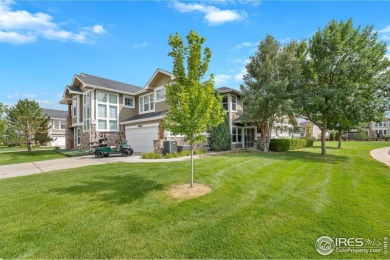 This stunning corner townhome backs to green space and offers a on Pelican Lakes Golf and Country Club in Colorado - for sale on GolfHomes.com, golf home, golf lot
