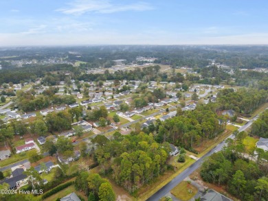 Beautiful approximately .68 acre property nestled in the acreage on Carolina Shores Golf Course in North Carolina - for sale on GolfHomes.com, golf home, golf lot