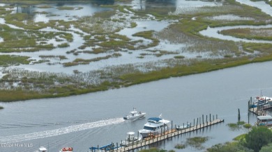 Beautiful approximately .68 acre property nestled in the acreage on Carolina Shores Golf Course in North Carolina - for sale on GolfHomes.com, golf home, golf lot