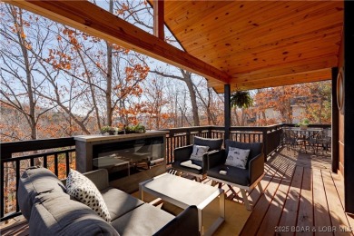 Welcome to one of the most impressive homes in Tan-Tar-A on The Oaks Golf Course in Missouri - for sale on GolfHomes.com, golf home, golf lot