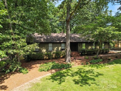 Welcome to this 1970s ranch-style home located in the desirable on Pine Island Country Club in North Carolina - for sale on GolfHomes.com, golf home, golf lot