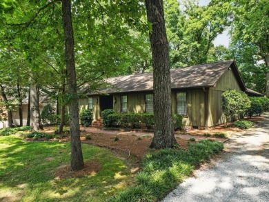 Welcome to this 1970s ranch-style home located in the desirable on Pine Island Country Club in North Carolina - for sale on GolfHomes.com, golf home, golf lot