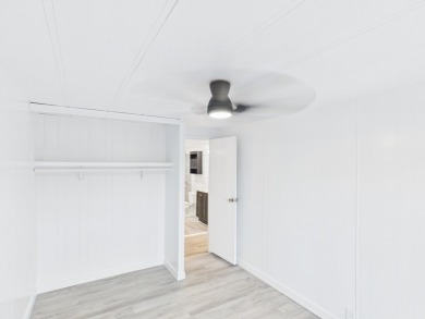 Updated home with large living spaces and a huge covered porch on Rockport Country Club in Texas - for sale on GolfHomes.com, golf home, golf lot