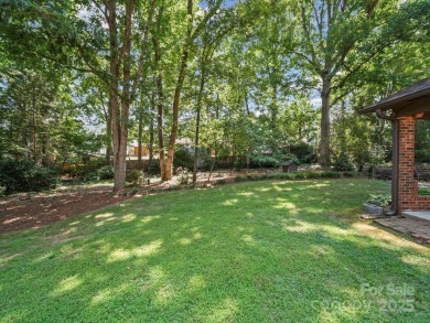 Welcome to this 1970s ranch-style home located in the desirable on Pine Island Country Club in North Carolina - for sale on GolfHomes.com, golf home, golf lot