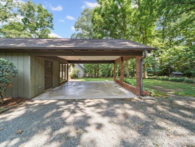 Welcome to this 1970s ranch-style home located in the desirable on Pine Island Country Club in North Carolina - for sale on GolfHomes.com, golf home, golf lot