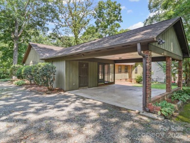 Welcome to this 1970s ranch-style home located in the desirable on Pine Island Country Club in North Carolina - for sale on GolfHomes.com, golf home, golf lot