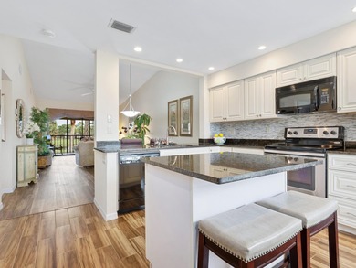 Move-in ready with breathtaking views! Panoramic pond and golf on The Meadows Golf and Country Club in Florida - for sale on GolfHomes.com, golf home, golf lot