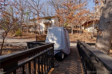 Welcome to one of the most impressive homes in Tan-Tar-A on The Oaks Golf Course in Missouri - for sale on GolfHomes.com, golf home, golf lot