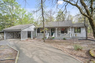 Beautifully maintained home in gated community. The cute covered on Holly Lake Ranch Golf Club in Texas - for sale on GolfHomes.com, golf home, golf lot