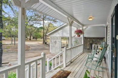 Beautifully maintained home in gated community. The cute covered on Holly Lake Ranch Golf Club in Texas - for sale on GolfHomes.com, golf home, golf lot