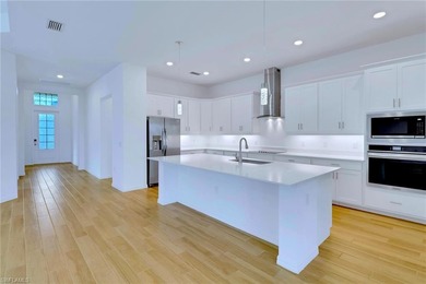 Luxury living meets modern comfort in The National Golf & on Panther Run Golf Club in Florida - for sale on GolfHomes.com, golf home, golf lot