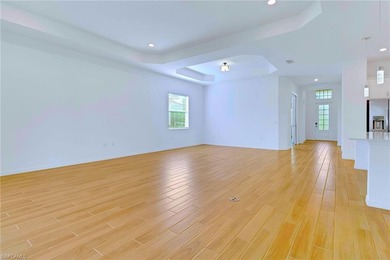 Luxury living meets modern comfort in The National Golf & on Panther Run Golf Club in Florida - for sale on GolfHomes.com, golf home, golf lot