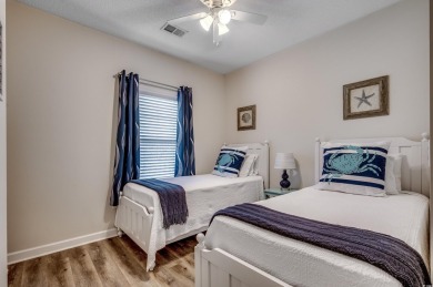 Discover effortless coastal living in this beautifully on Barefoot Resort and Golf Club  in South Carolina - for sale on GolfHomes.com, golf home, golf lot