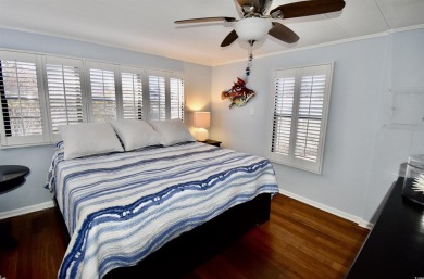 This charming 2-bedroom, 1-bathroom mobile home offers the on Barefoot Resort and Golf Club  in South Carolina - for sale on GolfHomes.com, golf home, golf lot