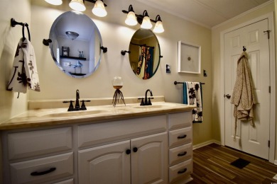 This charming 2-bedroom, 1-bathroom mobile home offers the on Barefoot Resort and Golf Club  in South Carolina - for sale on GolfHomes.com, golf home, golf lot