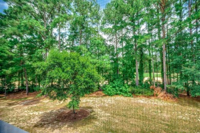 Discover effortless coastal living in this beautifully on Barefoot Resort and Golf Club  in South Carolina - for sale on GolfHomes.com, golf home, golf lot