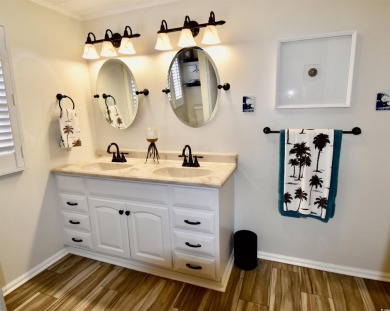 This charming 2-bedroom, 1-bathroom mobile home offers the on Barefoot Resort and Golf Club  in South Carolina - for sale on GolfHomes.com, golf home, golf lot