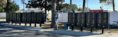 This charming 2-bedroom, 1-bathroom mobile home offers the on Barefoot Resort and Golf Club  in South Carolina - for sale on GolfHomes.com, golf home, golf lot