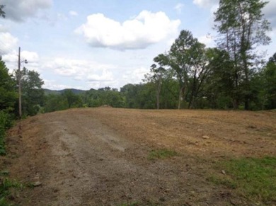 1.75 acres of vacant land with a variety of potential uses on Guyan Golf and Country Club in West Virginia - for sale on GolfHomes.com, golf home, golf lot
