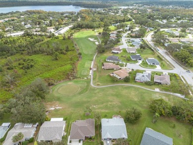 You do not want to miss out on this home in the highly on Highland Lakes Executive Golf Course in Florida - for sale on GolfHomes.com, golf home, golf lot