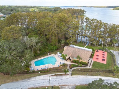 You do not want to miss out on this home in the highly on Highland Lakes Executive Golf Course in Florida - for sale on GolfHomes.com, golf home, golf lot