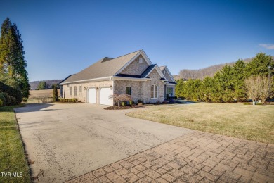 Welcome to a home where luxury meets comfort in the sought-after on Crocketts Ridge Golf Club in Tennessee - for sale on GolfHomes.com, golf home, golf lot