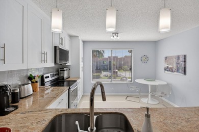 This tastefully updated condo is move-in ready and has been on Indian Spring Golf and Country Club in Florida - for sale on GolfHomes.com, golf home, golf lot