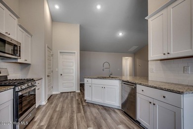 Welcome to your dream home! This stunning 3-bedroom, 2-bathroom on Brunswick Plantation and Golf Resorts in North Carolina - for sale on GolfHomes.com, golf home, golf lot