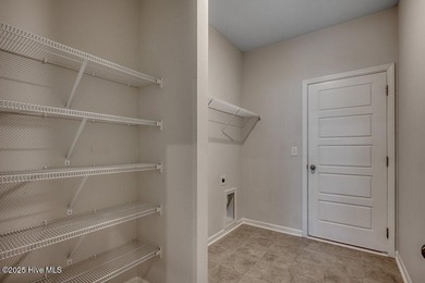 Welcome to your dream home! This stunning 3-bedroom, 2-bathroom on Brunswick Plantation and Golf Resorts in North Carolina - for sale on GolfHomes.com, golf home, golf lot