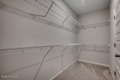 Welcome to your dream home! This stunning 3-bedroom, 2-bathroom on Brunswick Plantation and Golf Resorts in North Carolina - for sale on GolfHomes.com, golf home, golf lot