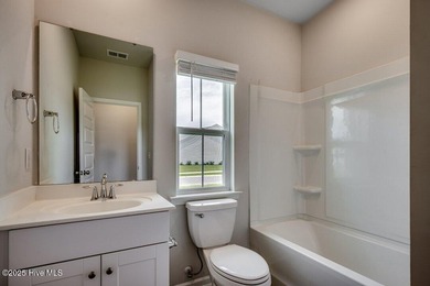 Welcome to your dream home! This stunning 3-bedroom, 2-bathroom on Brunswick Plantation and Golf Resorts in North Carolina - for sale on GolfHomes.com, golf home, golf lot