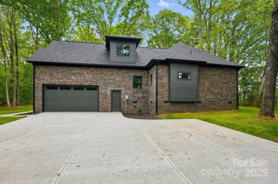 Custom Full Brick Home completed 2025. Private setting situated on Glen Oaks Golf and Country Club in North Carolina - for sale on GolfHomes.com, golf home, golf lot