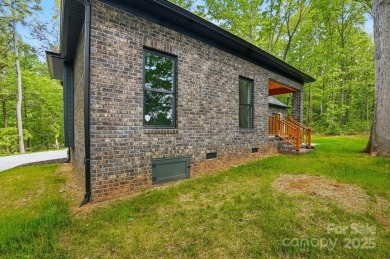 Custom Full Brick Home completed 2025. Private setting situated on Glen Oaks Golf and Country Club in North Carolina - for sale on GolfHomes.com, golf home, golf lot