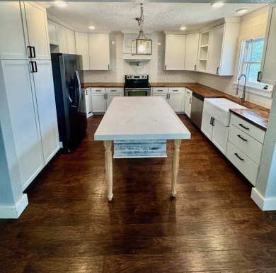 Adorable 2/2, just 3 blocks from the courthouse square & sits on on Llano River Golf Course in Texas - for sale on GolfHomes.com, golf home, golf lot
