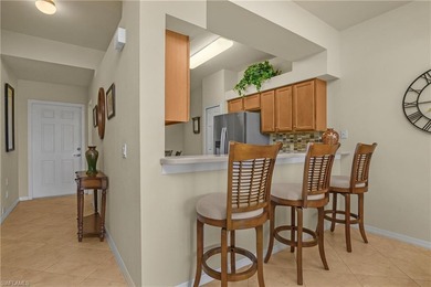 Experience resort-style living in this beautifully maintained on Bonita National Golf Course in Florida - for sale on GolfHomes.com, golf home, golf lot