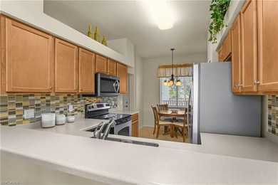 Experience resort-style living in this beautifully maintained on Bonita National Golf Course in Florida - for sale on GolfHomes.com, golf home, golf lot