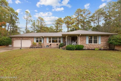 Quaint ranch style 3 bed 3 bathroom brick home on a quiet on Harbour Point Golf Club in North Carolina - for sale on GolfHomes.com, golf home, golf lot