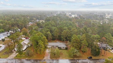 Quaint ranch style 3 bed 3 bathroom brick home on a quiet on Harbour Point Golf Club in North Carolina - for sale on GolfHomes.com, golf home, golf lot