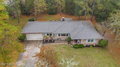 Quaint ranch style 3 bed 3 bathroom brick home on a quiet on Harbour Point Golf Club in North Carolina - for sale on GolfHomes.com, golf home, golf lot