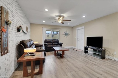 Step into this beautifully remodeled Spanish-style villa in The on The Glades Golf and Country Club in Florida - for sale on GolfHomes.com, golf home, golf lot