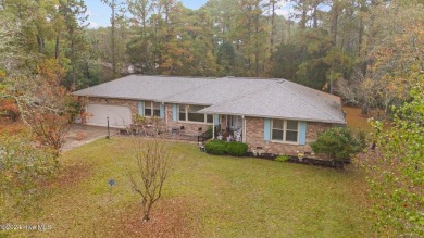 Quaint ranch style 3 bed 3 bathroom brick home on a quiet on Harbour Point Golf Club in North Carolina - for sale on GolfHomes.com, golf home, golf lot