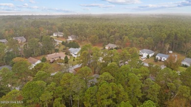 Quaint ranch style 3 bed 3 bathroom brick home on a quiet on Harbour Point Golf Club in North Carolina - for sale on GolfHomes.com, golf home, golf lot