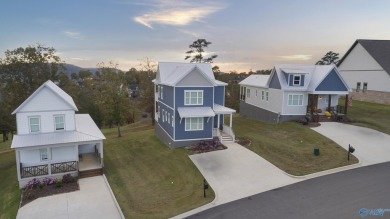 Welcome to this 3-bedroom, 3-bath Lake View Craftsman Cottage at on Gunters Landing in Alabama - for sale on GolfHomes.com, golf home, golf lot