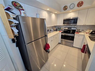 Beautifully maintained 1-bedroom, 1.5-bath condo in the highly on Flamingo Lakes Country Club in Florida - for sale on GolfHomes.com, golf home, golf lot