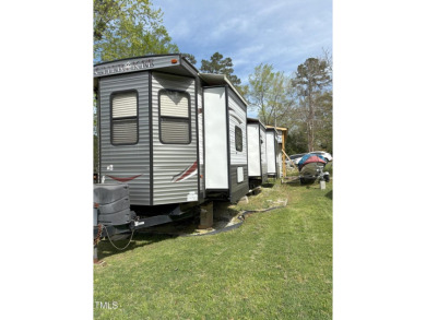 Waterfront Lot with 39' Forest River Camper - Lake Royale

 on River Golf and County Club at Lake Royale in North Carolina - for sale on GolfHomes.com, golf home, golf lot