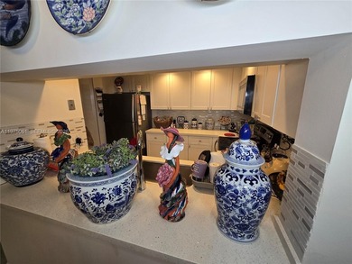 Beautifully maintained 1-bedroom, 1.5-bath condo in the highly on Flamingo Lakes Country Club in Florida - for sale on GolfHomes.com, golf home, golf lot