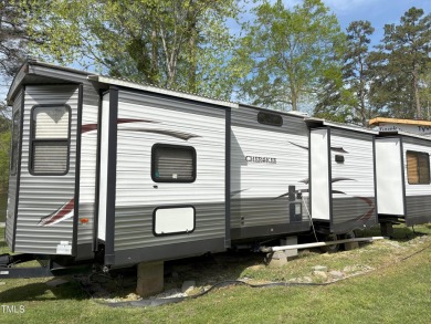 Waterfront Lot with 39' Forest River Camper - Lake Royale

 on River Golf and County Club at Lake Royale in North Carolina - for sale on GolfHomes.com, golf home, golf lot